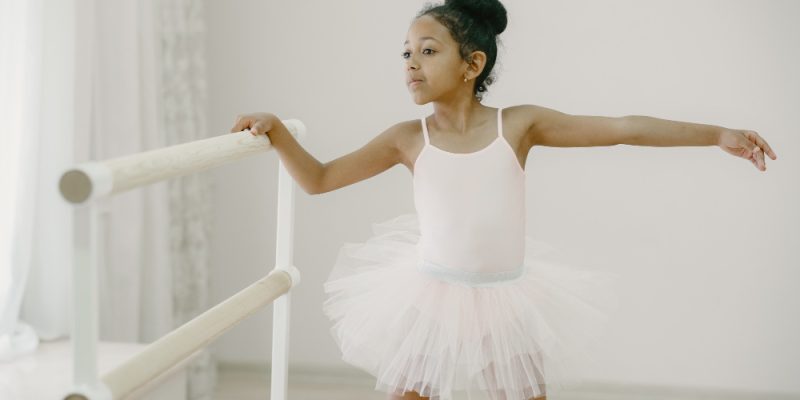 cute-little-ballerina-pink-ballet-costume-child-pointe-shoes-is-dancing-room-kid-dance-class